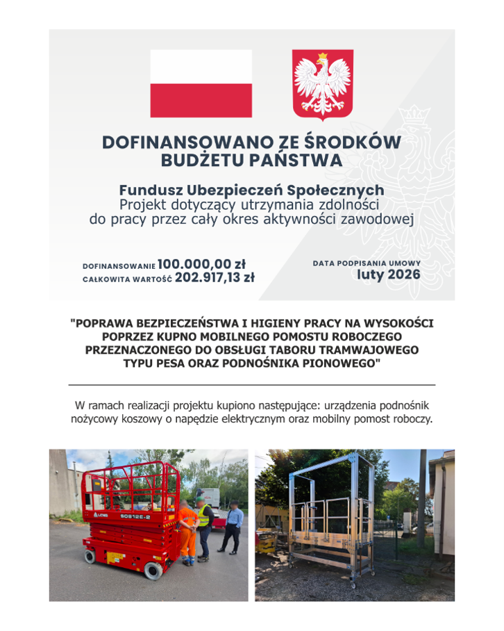 Bialy autobus miejski stojący pod ładowarką pantografową, obok niebiesko-żółty tramwaj